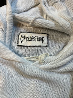 Distressed sweater
