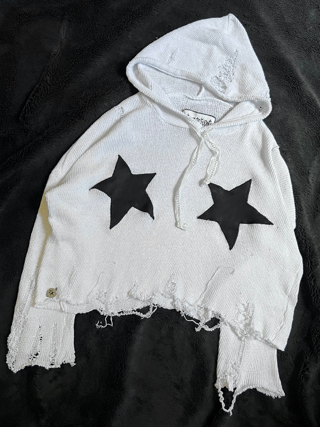 Distressed sweater