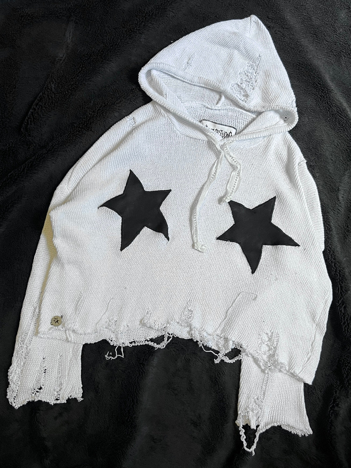 Distressed sweater